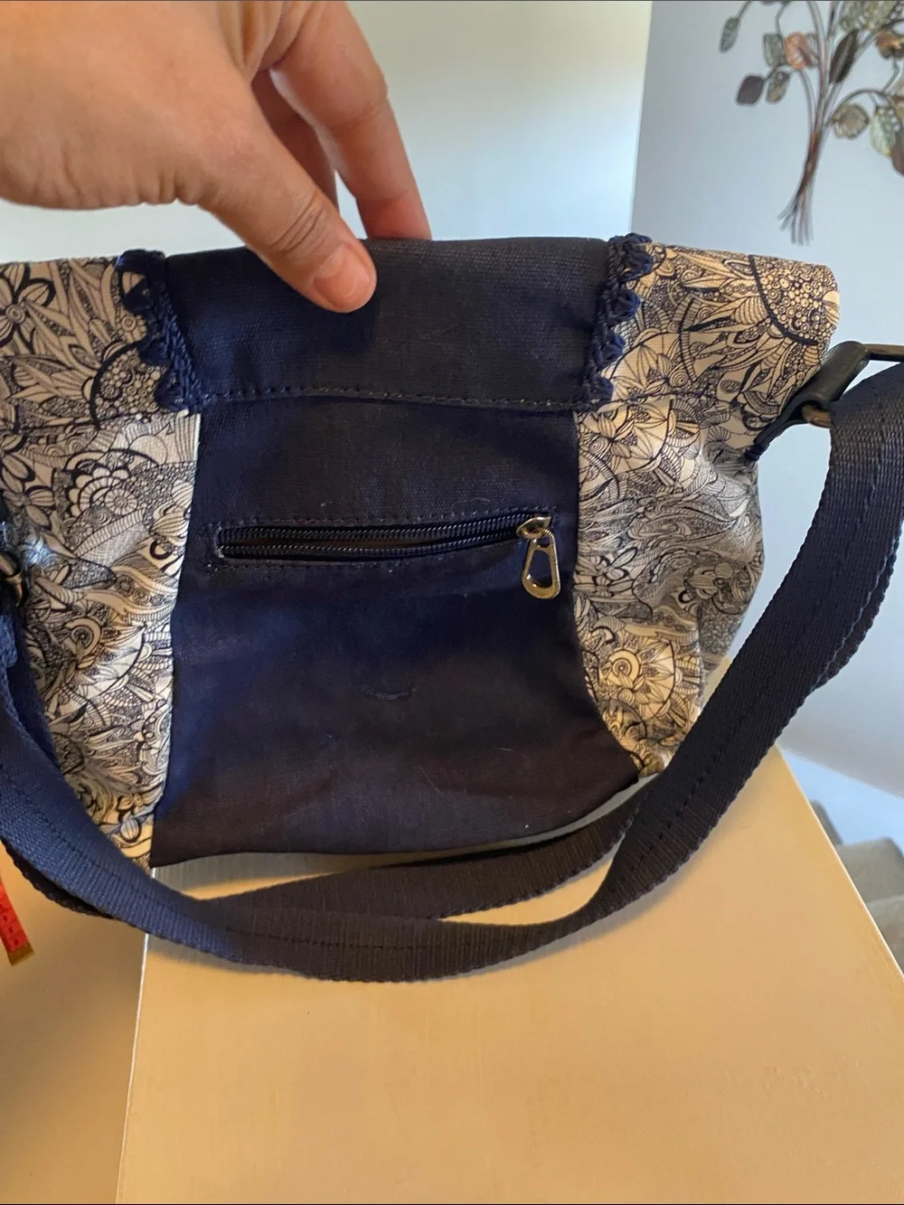 Sakroots Navy and White Floral Crossbody with Tassel Accent